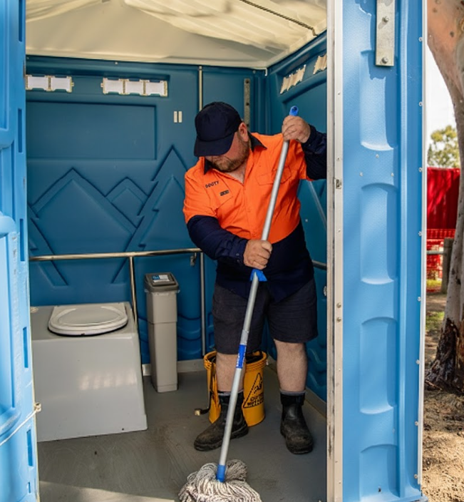 Professional cleaning and maintenance of portable toilets